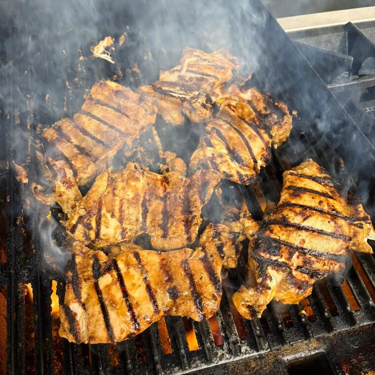 Marinated chicken on the charcoal grill
