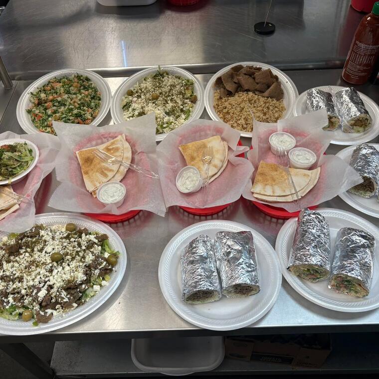Wraps and plates lined up on the counter